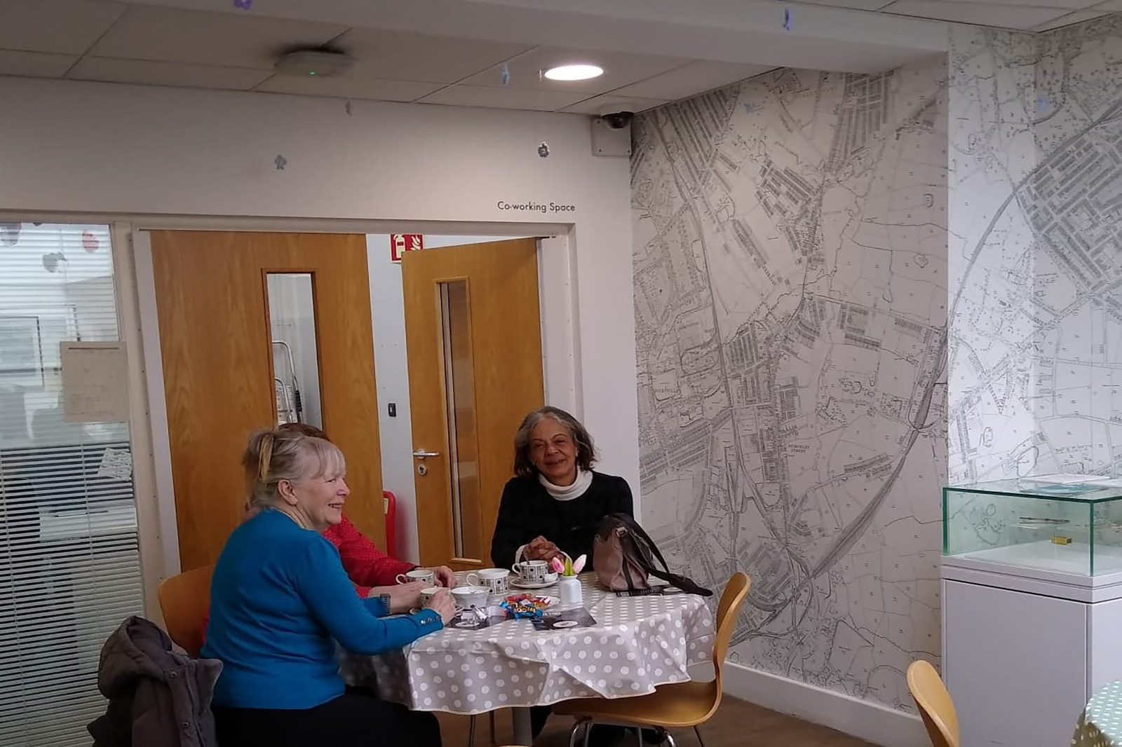 Visitors chatting over tea at Stirchley Circle 22